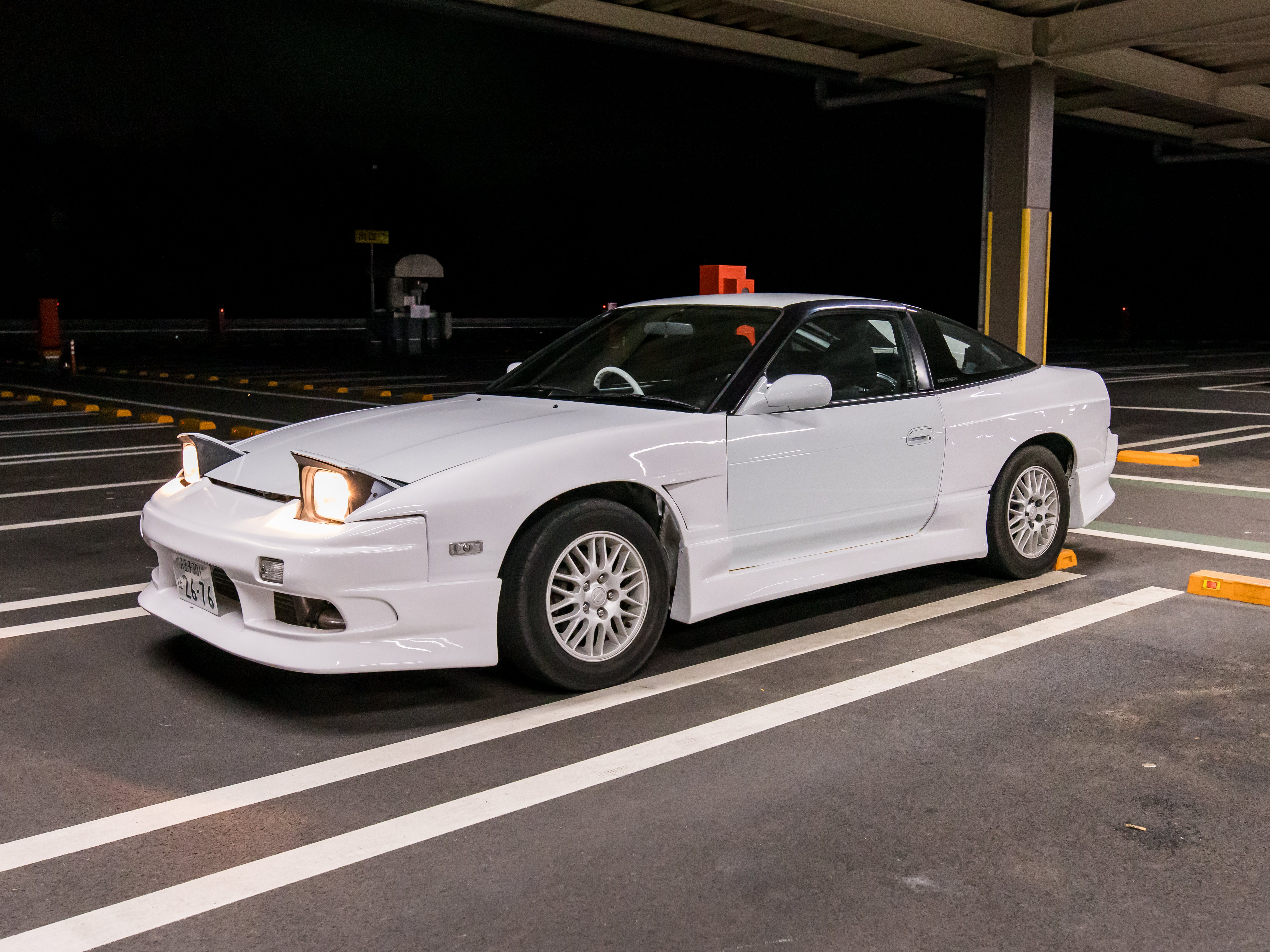 Widebody Nissan 180sx in white with S14 wheels